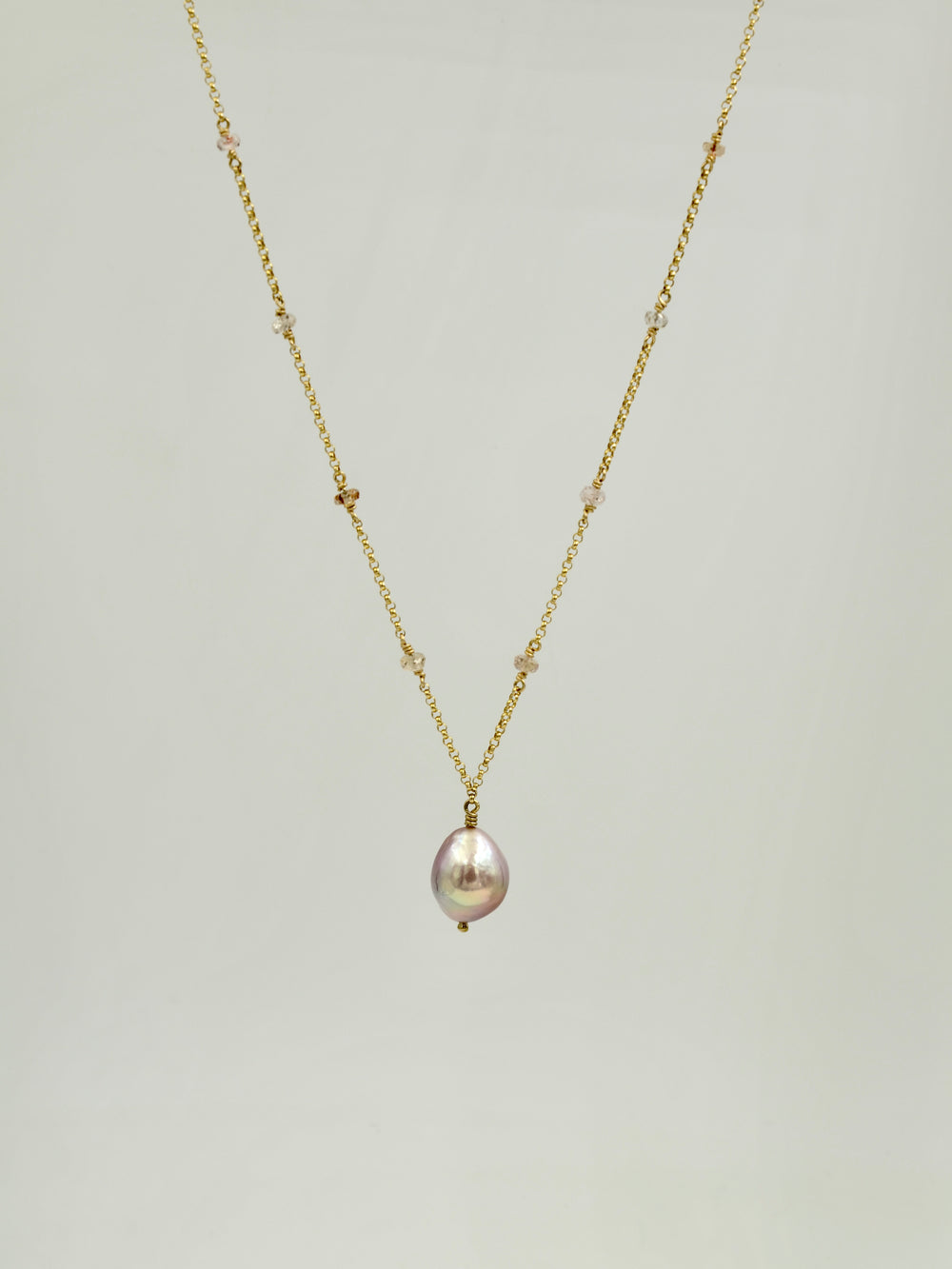 Pink Baroque Pearl Necklace with Imperial Topaz accents.
